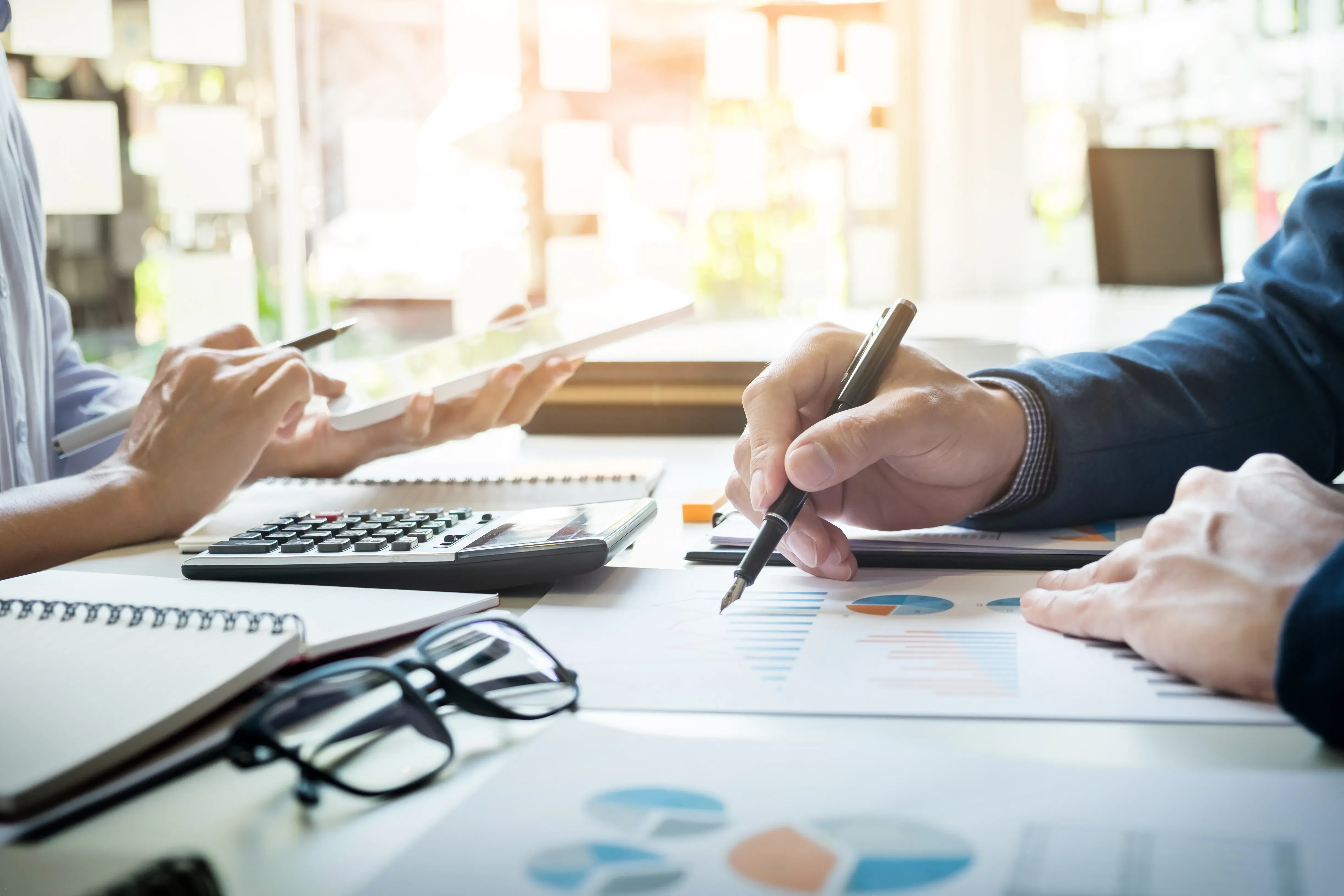 business-man-financial-inspector-secretary-making-report-calculating-checking-balance-internal-revenue-service-inspector-checking-document-audit-concept.webp